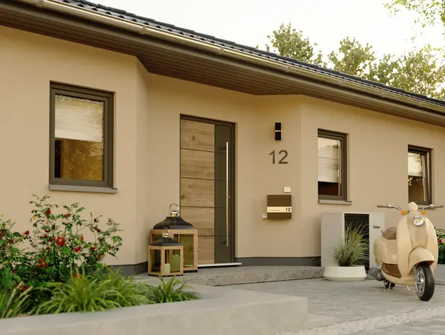Der Winkelbungalow 108 von Town & Country Haus mit großzügiger Terrasse, Garten und ebenerdigem Wohnkonzept in moderner Bauweise
